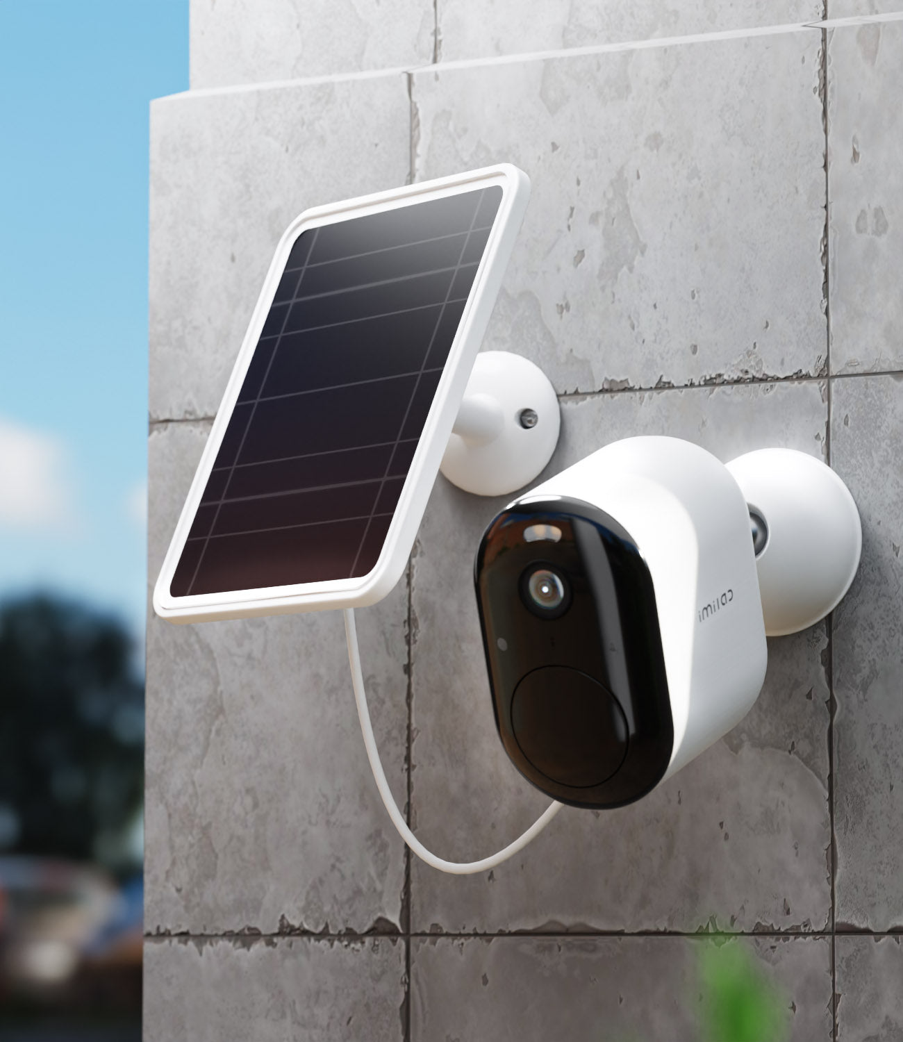 Solar-panel-charging-white-ec4-camera-on-grey-brick-wall-during-the-day