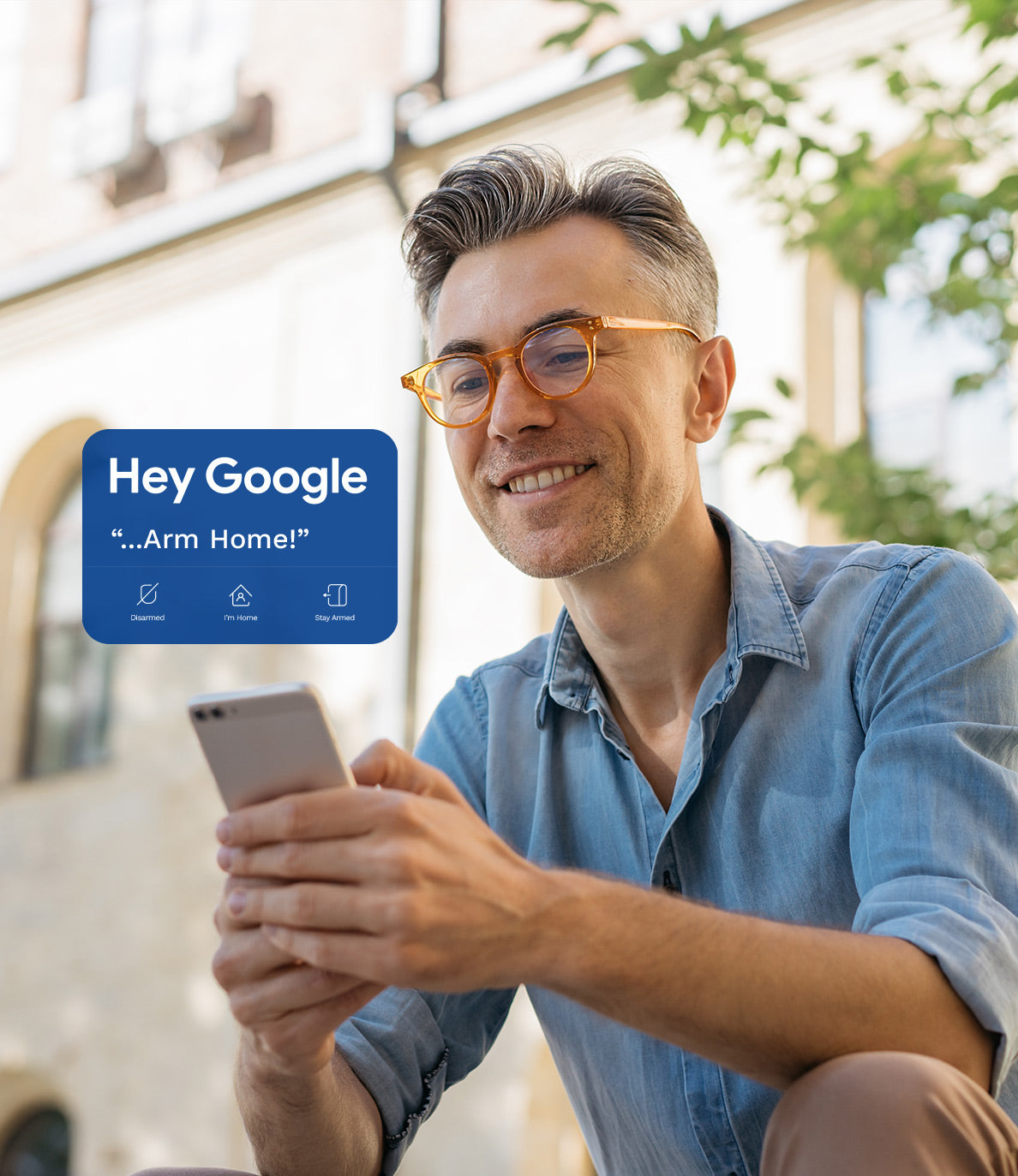 Smiling-middle-aged-man-with-glasses-using-apple-mobile-device-to-arm-home-burglar-system-with-voice-prompt
